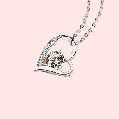 Elegant heart-shaped silver necklace with sparkling crystal centerpiece — perfect Mother’s Day gift for mom.
