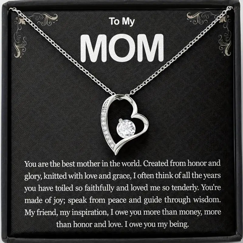 Elegant heart-shaped silver necklace with sparkling crystal centerpiece — perfect Mother’s Day gift for mom.